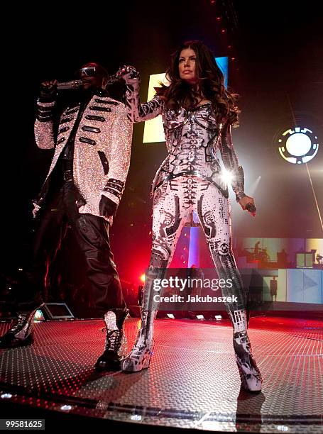 Singers Will.i.am and Fergie of the US-American hip-hop band Black Eyed Peas perform live during a concert at the O2 World on May 15, 2010 in Berlin,...