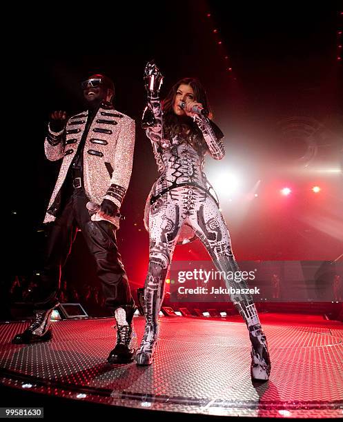 Singers Will.i.am and Fergie of the US-American hip-hop band Black Eyed Peas perform live during a concert at the O2 World on May 15, 2010 in Berlin,...