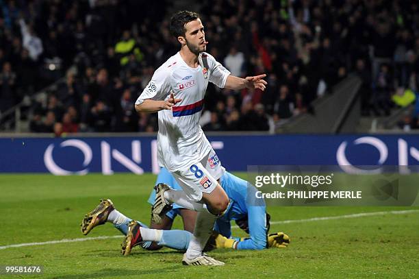 Lyon's Bosnian midfielder Miralem Pjanic celebrates after scoring a goal during the French L1 football match Lyon vs. Le Mans May 15, 2010 at the...