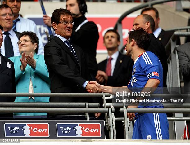 England Manager Fabio Capello shakes hands with Frank Lampard of Chelsea after the FA Cup sponsored by E.ON Final match between Chelsea and...