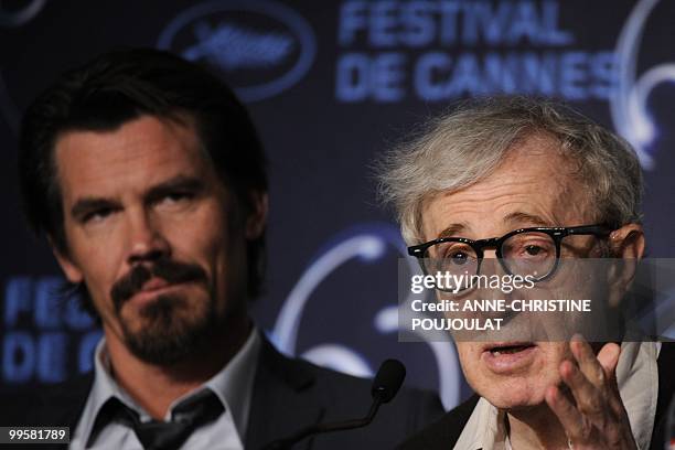 Director Woody Allen speaks next to US actor Josh Brolin during the press conference of "You Will Meet a Tall Dark Stranger" presented out of...