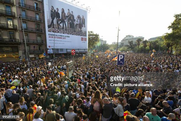 Demonstrators on the streets during a general strike in Barcelona, Spain, 3 October 2017. Several hundred thousand people protested against police...