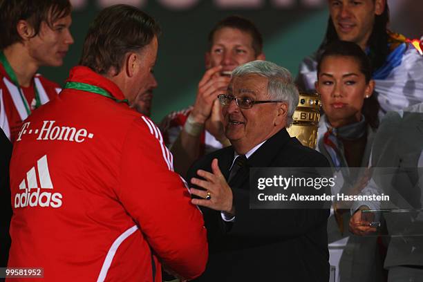 Head coach Louis van Gaal of Bayern Muenchen receives the winner's medal by Theo Zwanziger , president of the German Football Association DFB...