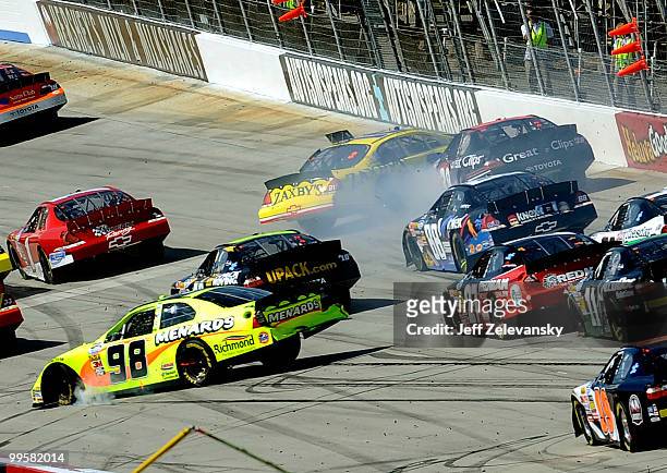 Clint Bowyer, driver of the Zaxby's Chevrolet, collides with Kasey Kahne, driver of the Great Clips Toyota, during the NASCAR Nationwide Series...