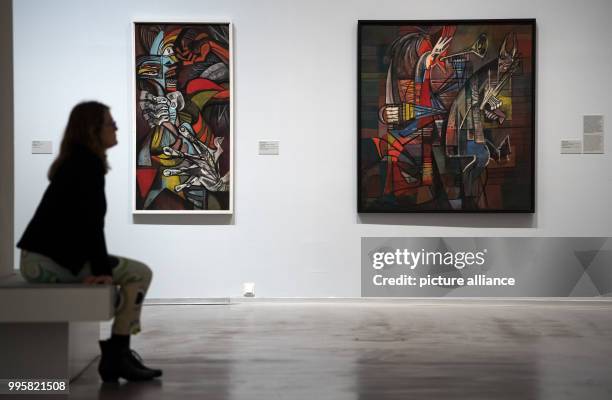 Visitor sitting in the exhibition "Jeanne Mammen - The Observer - Retrospective 1910-1975" at the Berlinische Galerie in Berlin, Germany, 4 October...