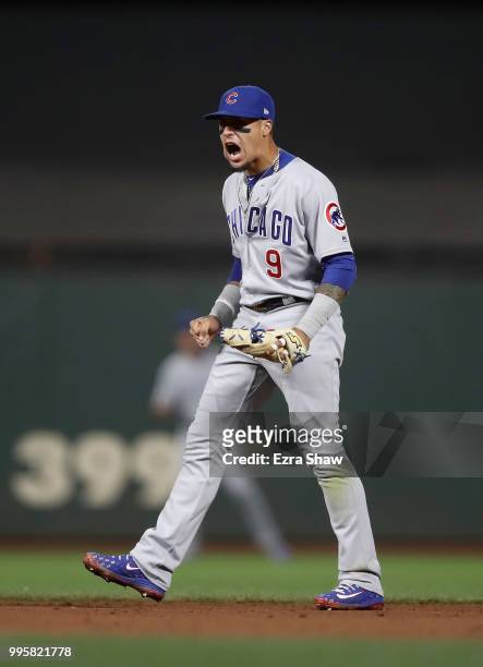 Javier Baez of the Chicago Cubs reacts after Jose Quintana of the Chicago Cubs struck out Brandon Belt of the San Francisco Giants in the sixth...
