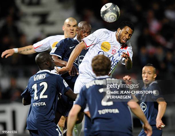 Nancy's French defender Jordan Loties fights for the ball with Valencienne's Ghuinean defender Dianobo Balde during the French L1 football match...