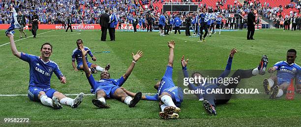 Chelsea players celebrate after beating Portsmouth 1-0 during the FA Cup Final football match at Wembley, in north London, on May 15, 2010. AFP...