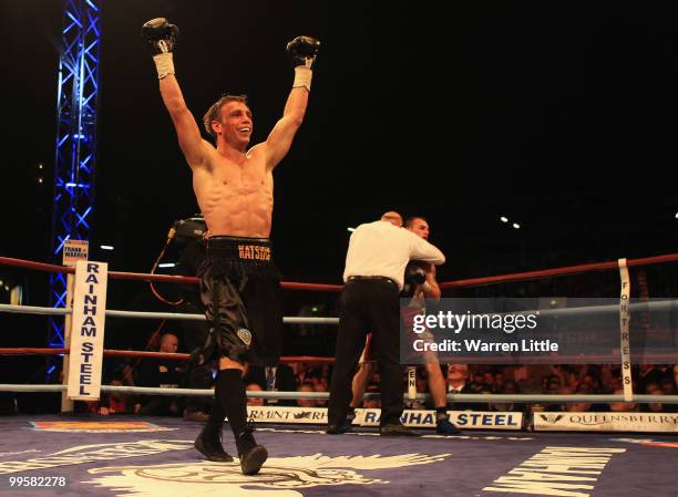 Michael Katsidis of Australia celebrates beating Kevin Mitchell of England in the third round to retain the WBO Lightweight Championship of the World...