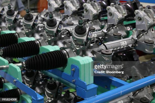 Electric power steering gears sit on the production line at the Jtekt Corp. Hanazono plant in Okazaki, Aichi Prefecture, Japan, on Tuesday, July 10,...