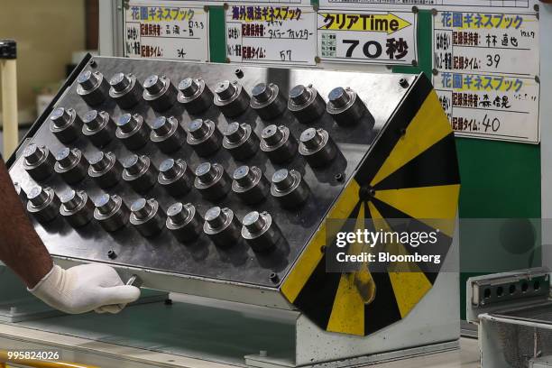 Auto parts sit in a die casting area at the Jtekt Corp. Hanazono plant in Okazaki, Aichi Prefecture, Japan, on Tuesday, July 10, 2018. JTEKT will...