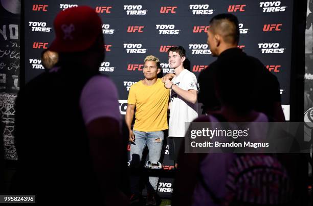 Flyweight fighter Joseph Benavidez interacts with fans during the UFC Fan Experience at the Downtown Las Vegas Events Center on July 7, 2018 in Las...