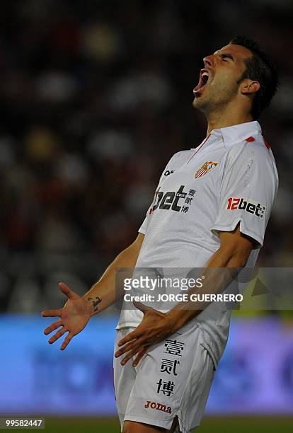Sevilla's midfielder Alvaro Negredo gestures during a Spanish league football match against Almeria at Juegos del Mediterraneo stadium in Almeria on...