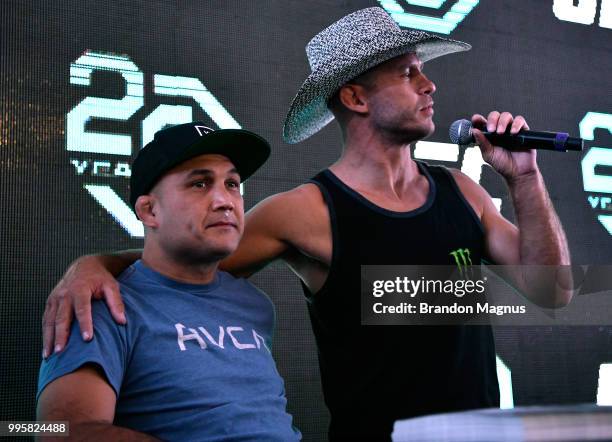 Welterweight fighter Donald Cerrone and UFC Hall of Famer BJ Penn interact with fans during the UFC Fan Experience at the Downtown Las Vegas Events...