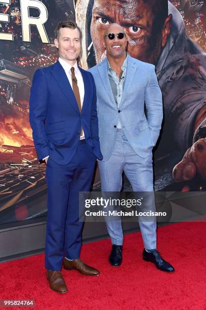 Rawson Marshall Thurber and Dwayne Johnson attend the 'Skyscraper' New York Premiere at AMC Loews Lincoln Square on July 10, 2018 in New York City.