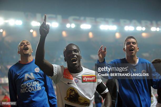 Montpellier's captain Victor Hugo Montano Caicedo celebrates with teammates after winning their French L1 football match Paris Saint-Germain vs...