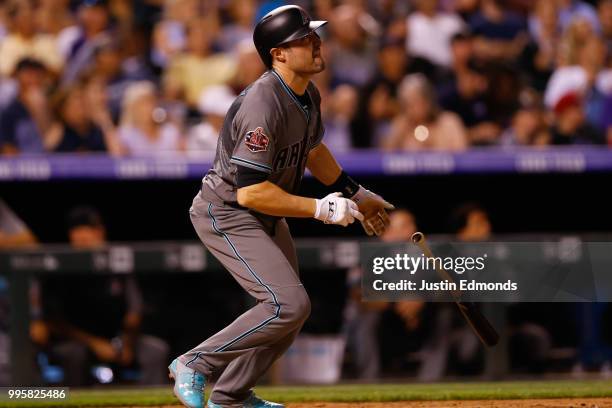 Pollock of the Arizona Diamondbacks watches his solo home run during the seventh inning against the Colorado Rockies at Coors Field on July 10, 2018...