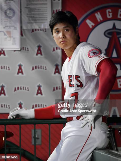 Los Angeles Angels of Anaheim designated hitter Shohei Ohtani in the dugout in the third inning of a game against the Seattle Mariners played on July...