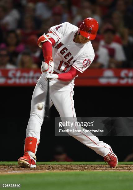 Los Angeles Angels of Anaheim designated hitter Shohei Ohtani fouls off a pitch in the fourth inning of a game against the Seattle Mariners played on...