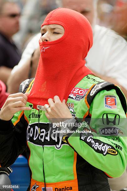 Danica Patrick of Andretti Autosport readies to get in her car during opening day at the Indianapolis Motor Speedway on May 15, 2010 in Indianapolis,...