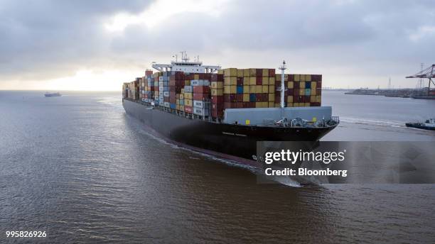 The Soro Enshi container ship, operated by A.P. Moller-Maersk A/S, sails from Yangshan Deep Water Port in this aerial photograph taken in Shanghai,...