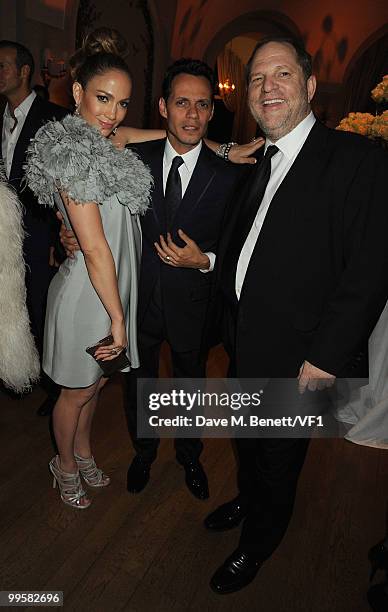 Actress Jennifer Lopez, singer Marc Anthony and producer Harvey Weinstein attend the Vanity Fair and Gucci Party Honoring Martin Scorsese during the...