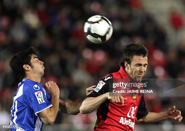 Mallorca's forward Victor Manuel Casadesus vies with Espanyol's defender Jordi Amat during their Spanish League football match at the Ono Stadium in...