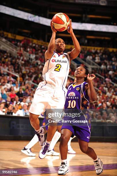 Temeka Johnson of the Phoenix Mercury shoots against Andrea Riley of the Los Angeles Sparks in an WNBA game played on May 15, 2010 at U.S. Airways...