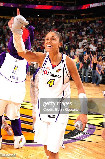 Candice Dupree of the Phoenix Mercury throws tshirts to fans following the game against the Los Angeles Sparks in an WNBA game played on May 15, 2010...