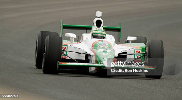 Tony Kanaan of Andretti Autosport makes way through the first turn at the Indianapolis Motor Speedway during opening day at the Indianapolis Motor...