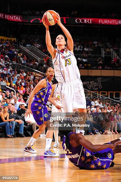 Penny Taylor of the Phoenix Mercury shoots against Marie Ferdinand-Harris of the Los Angeles Sparks in an WNBA game played on May 15, 2010 at U.S....