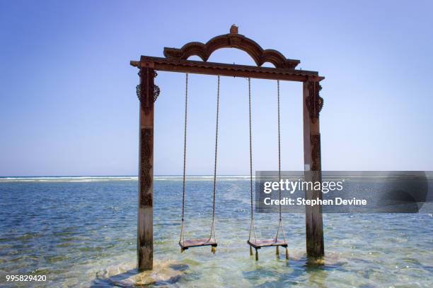 gili trawangan swings, indonesia - gili trawangan stock pictures, royalty-free photos & images