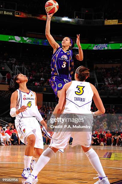 Candace Parker of the Los Angeles Sparks shoots against Candice Dupree of the Phoenix Mercury in an WNBA game played on May 15, 2010 at U.S. Airways...