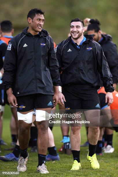 Sam Lousi and Jeff Toomaga-Allen enjoy a laugh during a Hurricanes Super Rugby training session at Rugby League Park on July 11, 2018 in Wellington,...