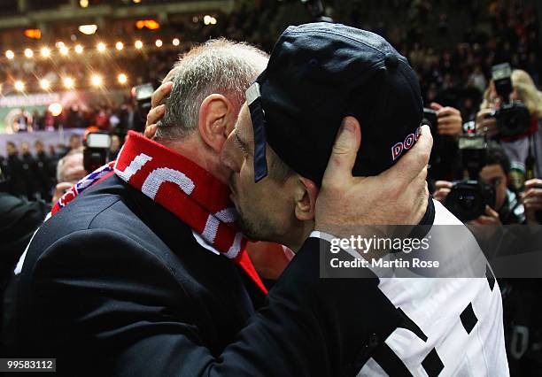 President Uli Hoeness of Bayern kisses Franck Ribery after winning the DFB Cup final match between SV Werder Bremen and FC Bayern Muenchen at Olympic...