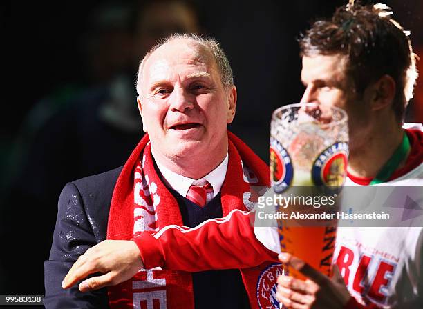 President Uli Hoeness of Bayern celebrates with Thomas Mueller after winning the DFB Cup final match between SV Werder Bremen and FC Bayern Muenchen...