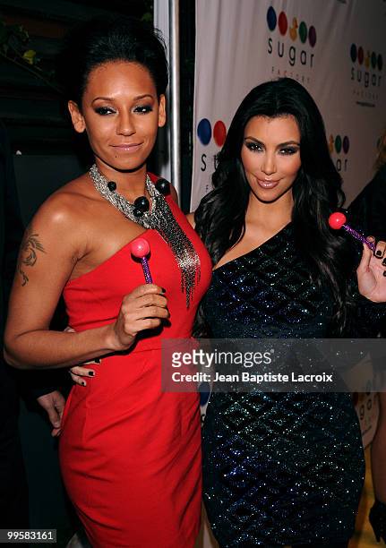 Melanie Brown aka Mel B and Kim Kardashian attend the launch of Mel B's Sugar Factory Couture Lollipop at Guys and Dolls Lounge on January 19, 2010...