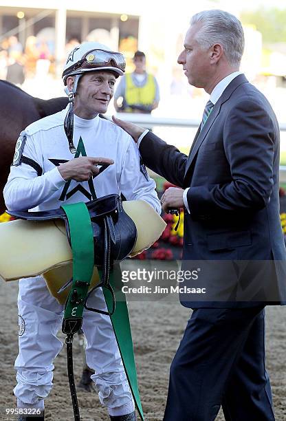 Trainer Todd Pletcher consoles Super Saver jockey Calvin Borel after the 135th running of the Preakness Stakes at Pimlico Race Course on May 15, 2010...