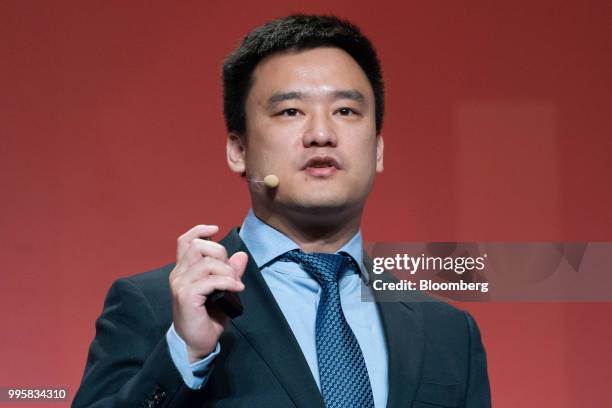 Bob Zhang, co-founder and chief technology officer of Didi Chuxing, speaks during the Rise conference in Hong Kong, China, on Wednesday, July 11,...