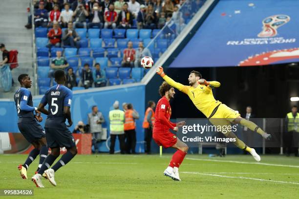 Paul Pogba of France, Samuel Umtiti of France, Marouane Fellaini of Belgium, France goalkeeper Hugo Lloris during the 2018 FIFA World Cup Semi Final...