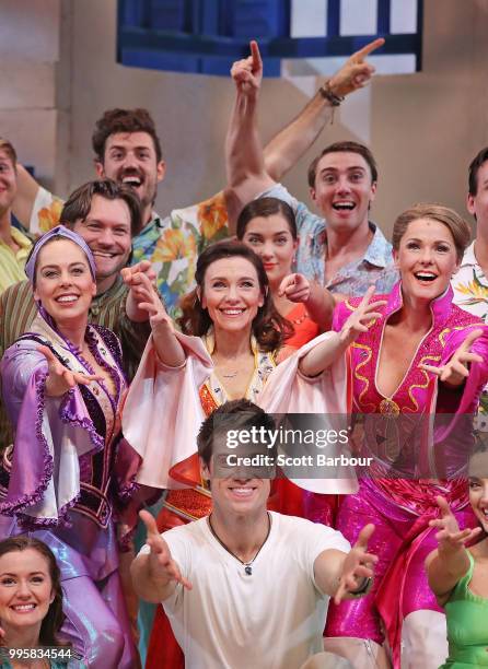Lisa Sontag, Natalie O'Donnell , Sarah Kate Landy and the cast pose during a production media call for Mamma Mia! The Musical at Princess Theatre on...