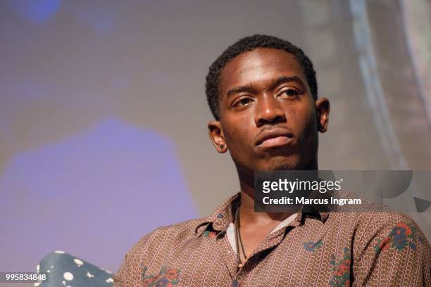 Actor Damson Idris speaks on stage during the Atlanta screening of "Snowfall" season 2 at SCAD Show on July 10, 2018 in Atlanta, Georgia.