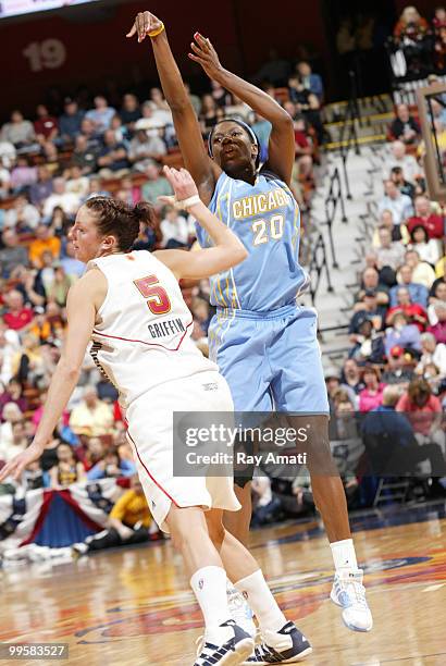 Shameka Christon of the Chicago Sky shoots over Kelsey Griffin of the Connecticut Sun on May 15, 2010 at Mohegan Sun Arena in Uncasville,...