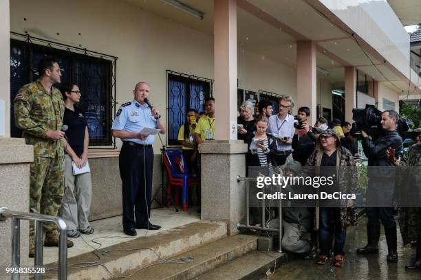 Australian federal police commander Glen McEwen speaks to the press about Australia's involvement in the cave rescue at a press centre near Tham...