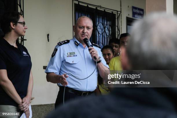 Australian federal police commander Glen McEwen speaks to the press about Australia's involvement in the cave rescue at a press centre near Tham...