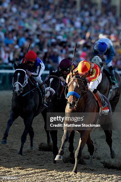 Lookin at Lucky, riden by Martin Garcia crosses the finish line ahead of First Dude, riden by Ramon Dominguez and Jackson Bend, riden by Mike Smith...