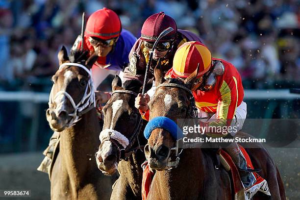 Lookin at Lucky, riden by Martin Garcia crosses the finish line ahead of First Dude, riden by Ramon Dominguez and Jackson Bend, riden by Mike Smith...