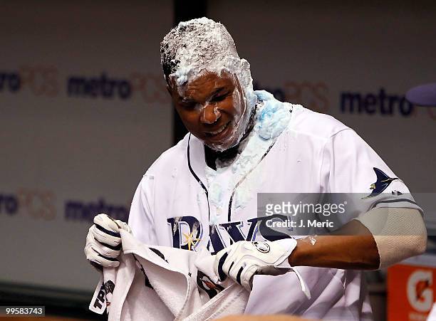 Designated hitter Willy Aybar of the Tampa Bay Rays is covered in shaving cream after his bottom on the ninth walk off home run against the Seattle...
