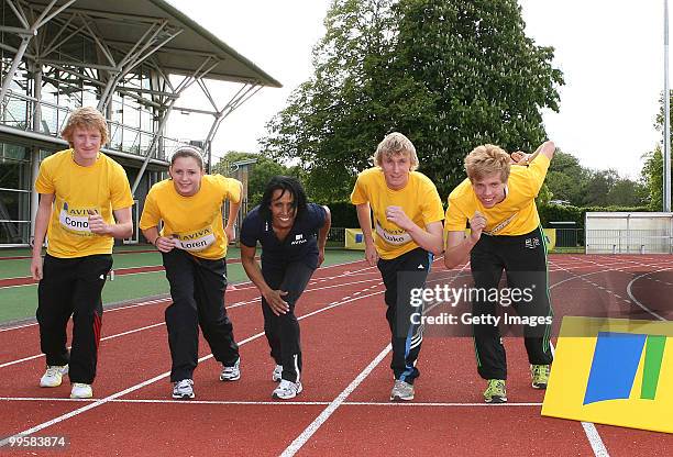 Conor Robinson,Loren Bleaken, Kelly Holmes, Luke Carroll and Tom Curr pose during the Aviva sponsored mentoring day at Loughborough College on May...