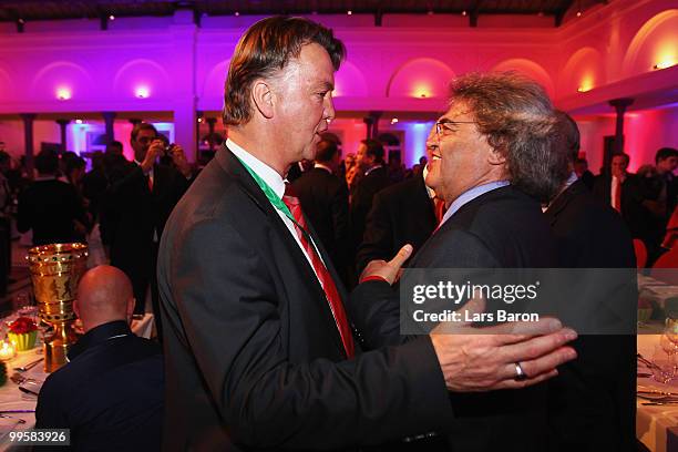 Head coach Louis van Gaal and publisher Helmut Markwort attend the Bayern Muenchen Champions Party after the DFB Cup Final match against Werder...